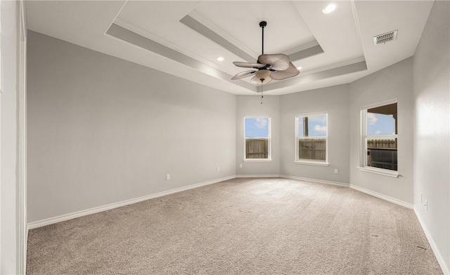 14149 Coquina Bay Ave, Corpus Christi, TX 78418 - carpeted spare room with a raised ceiling, ceiling fan, recessed lighting, baseboards, and ornamental molding