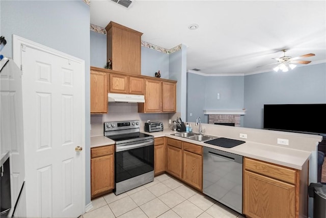 kitchen with sink, ornamental molding, ceiling fan, kitchen peninsula, and stainless steel appliances