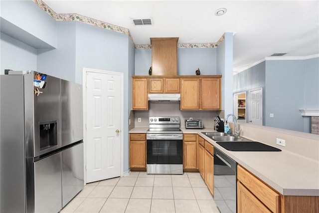 kitchen featuring light tile patterned flooring, appliances with stainless steel finishes, sink, kitchen peninsula, and crown molding