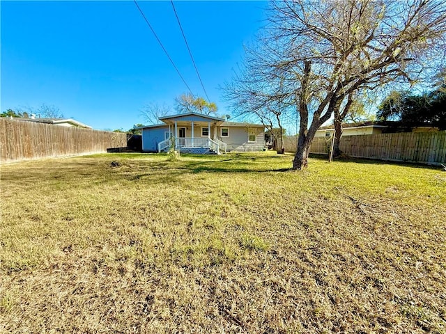 view of yard with a porch