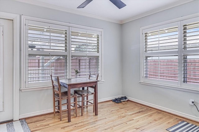 209 Jackson Pl, Corpus Christi, TX 78411 - dining room with a ceiling fan, wood finished floors, ornamental molding, and plenty of natural light