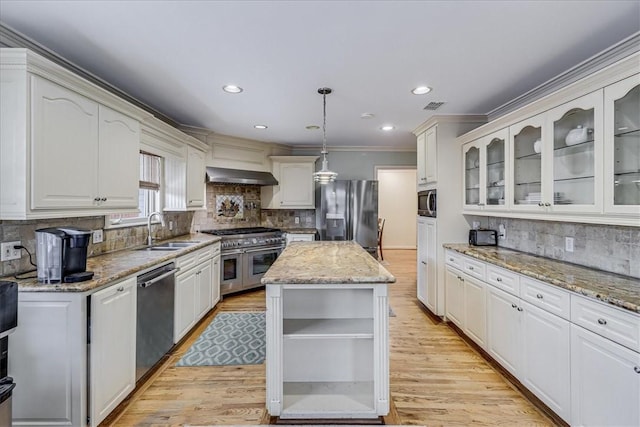 209 Jackson Pl, Corpus Christi, TX 78411 - kitchen with appliances with stainless steel finishes, open shelves, range hood, backsplash, and recessed lighting