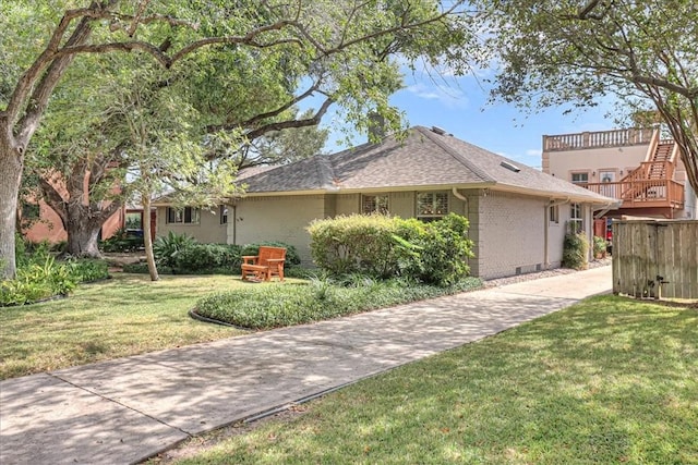209 Jackson Pl, Corpus Christi, TX 78411 - view of front facade featuring brick siding and a shingled roof