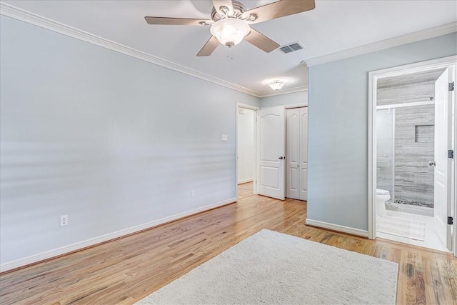 209 Jackson Pl, Corpus Christi, TX 78411 - unfurnished bedroom featuring wood finished floors, ornamental molding, ensuite bath, and a ceiling fan