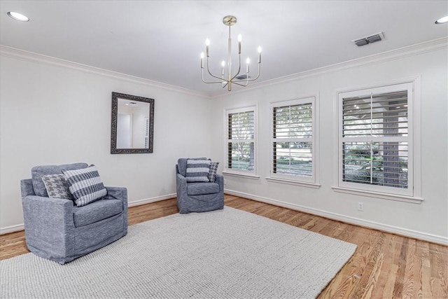 209 Jackson Pl, Corpus Christi, TX 78411 - living area with wood finished floors, crown molding, a chandelier, and recessed lighting