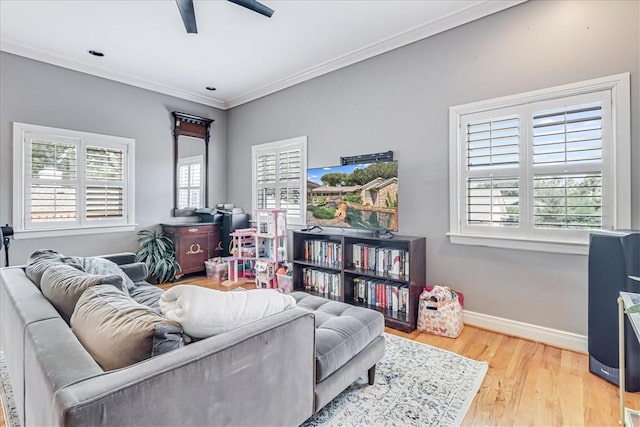 209 Jackson Pl, Corpus Christi, TX 78411 - living area with light wood-style floors, a ceiling fan, and crown molding
