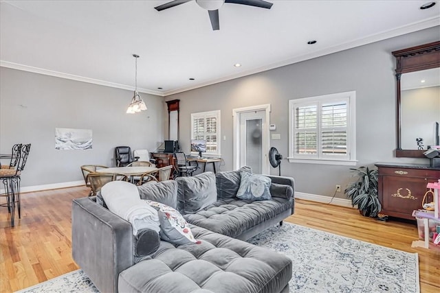 209 Jackson Pl, Corpus Christi, TX 78411 - living room with wood finished floors, ceiling fan, crown molding, and recessed lighting