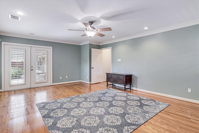209 Jackson Pl, Corpus Christi, TX 78411 - living area featuring a ceiling fan, wood finished floors, ornamental molding, french doors, and recessed lighting