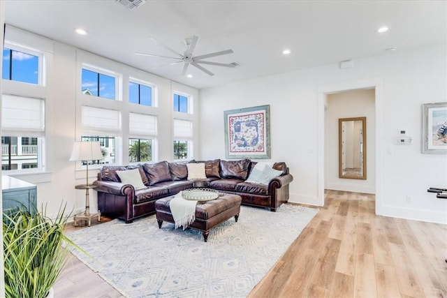 320 Coastline Dr, Port Aransas, TX 78373 - living room featuring ceiling fan, healthy amount of natural light, baseboards, and recessed lighting