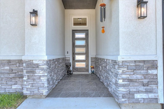 4102 Fold Ln, Corpus Christi, TX 78414 - property entrance featuring stone siding and stucco siding
