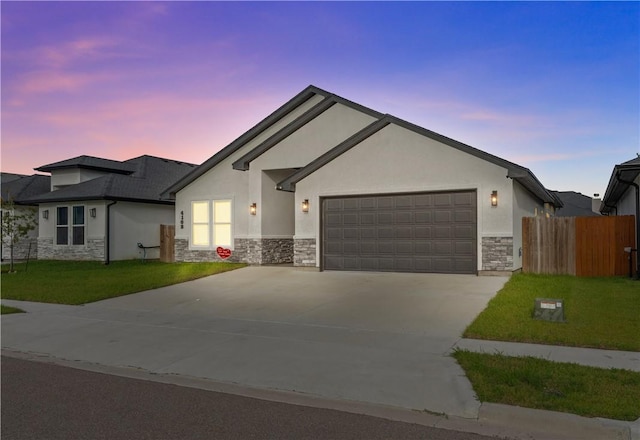 4102 Fold Ln, Corpus Christi, TX 78414 - ranch-style home featuring stone siding, stucco siding, a garage, and concrete driveway