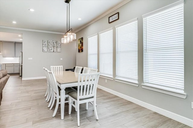 4102 Fold Ln, Corpus Christi, TX 78414 - dining space featuring crown molding, light wood-style floors, recessed lighting, and a chandelier