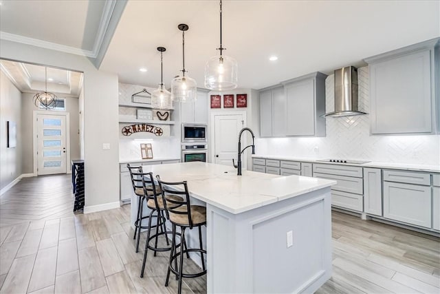 4102 Fold Ln, Corpus Christi, TX 78414 - kitchen featuring wall chimney exhaust hood, stainless steel appliances, crown molding, open shelves, and tasteful backsplash