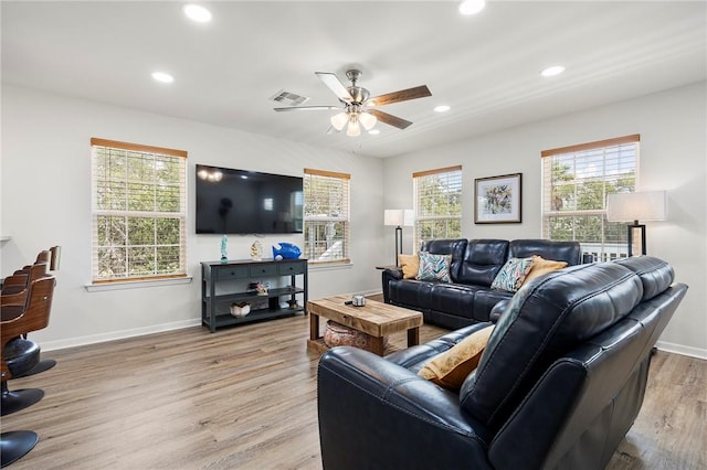 607 Huisache Lane, Ingleside On The Bay, TX 78362 - living room with a ceiling fan, light wood finished floors, recessed lighting, and baseboards