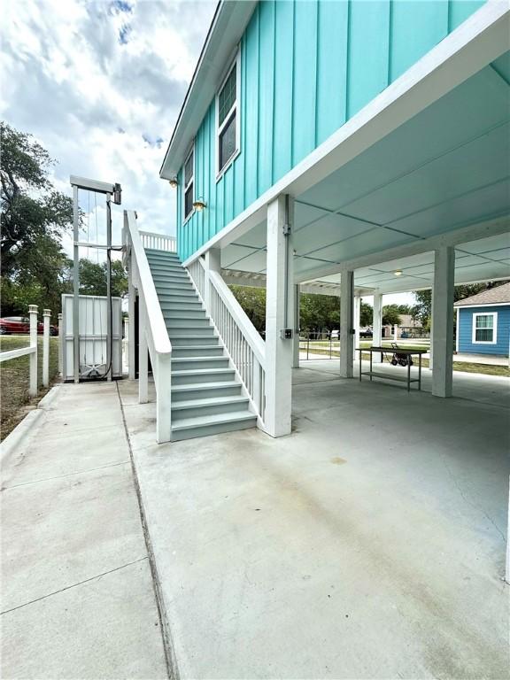 607 Huisache Lane, Ingleside On The Bay, TX 78362 - view of patio / terrace with stairs