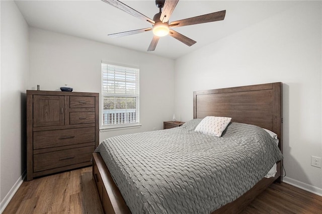 607 Huisache Lane, Ingleside On The Bay, TX 78362 - bedroom featuring wood finished floors, baseboards, and a ceiling fan