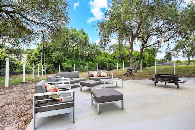 607 Huisache Lane, Ingleside On The Bay, TX 78362 - view of property's community featuring an outdoor living space with a fire pit and a patio