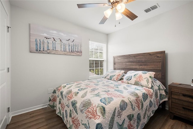 607 Huisache Lane, Ingleside On The Bay, TX 78362 - bedroom with wood finished floors, baseboards, and a ceiling fan