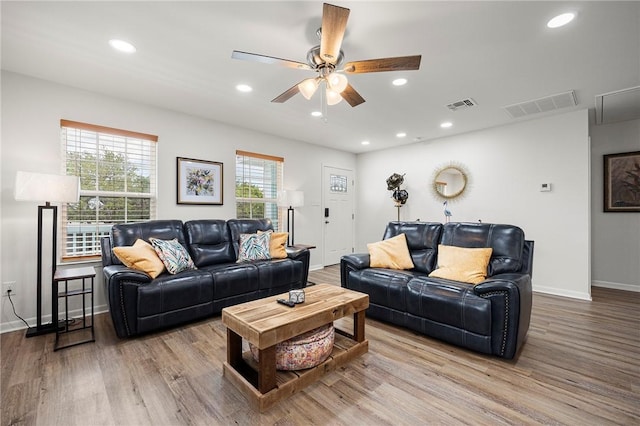 607 Huisache Lane, Ingleside On The Bay, TX 78362 - living area with ceiling fan, wood finished floors, recessed lighting, and baseboards
