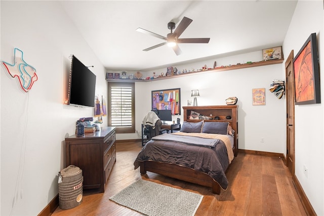 5502 E Riverview Dr, Corpus Christi, TX 78410 - bedroom with wood finished floors and a ceiling fan