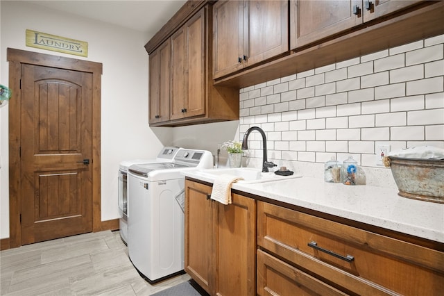 5502 E Riverview Dr, Corpus Christi, TX 78410 - laundry area with independent washer and dryer and cabinet space