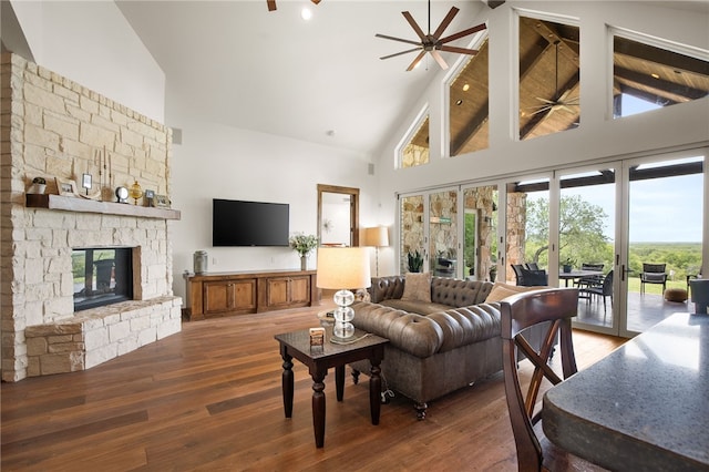 5502 E Riverview Dr, Corpus Christi, TX 78410 - living area with high vaulted ceiling, hardwood / wood-style floors, ceiling fan, a fireplace, and beam ceiling