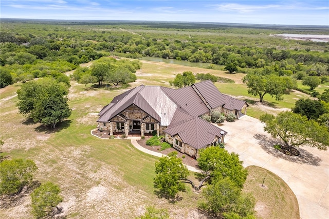 5502 E Riverview Dr, Corpus Christi, TX 78410 - aerial view of property and surrounding area with a heavily wooded area and a large body of water