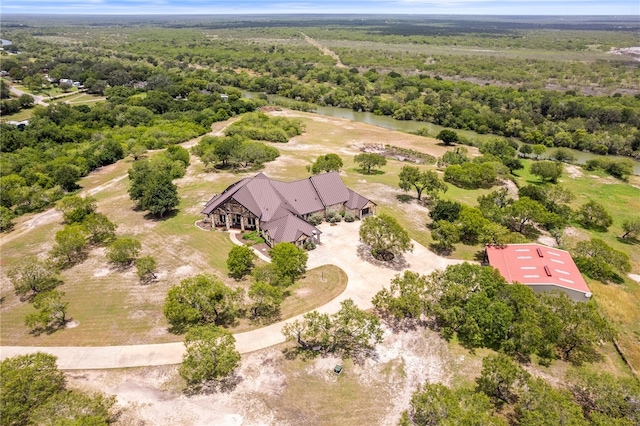 5502 E Riverview Dr, Corpus Christi, TX 78410 - aerial view of property and surrounding area featuring a heavily wooded area