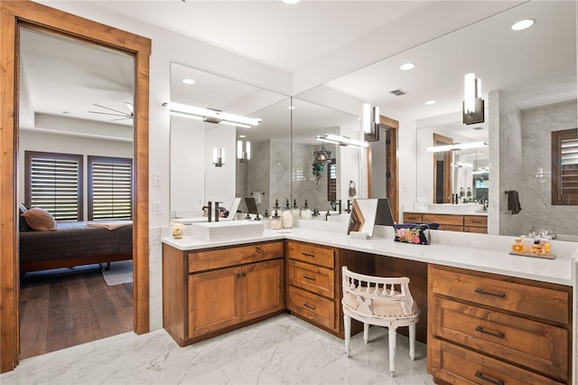 5502 E Riverview Dr, Corpus Christi, TX 78410 - full bath with ensuite bathroom, marble finish flooring, a marble finish shower, vanity, and a ceiling fan