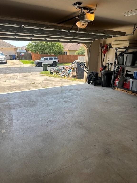 3921 Gladstone Dr, Corpus Christi, TX 78414 - garage featuring a garage door opener