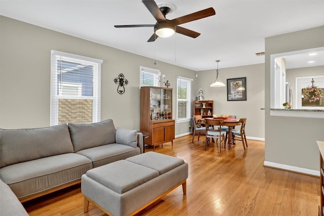 934 Cunningham St, Corpus Christi, TX 78411 - living room with a ceiling fan and light wood-style flooring