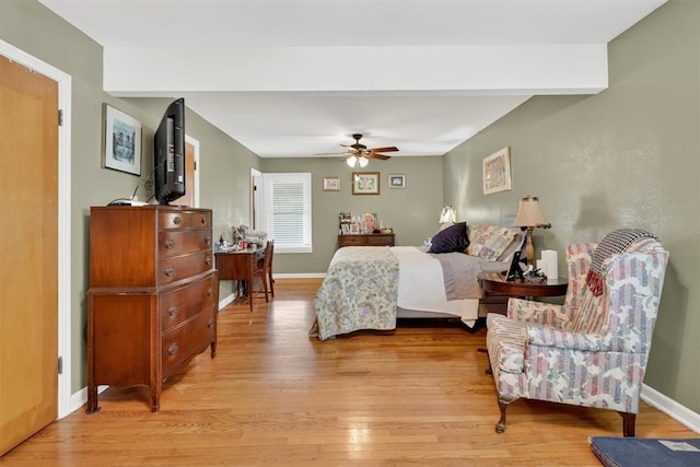 934 Cunningham St, Corpus Christi, TX 78411 - bedroom featuring light wood-style floors, beamed ceiling, and a ceiling fan