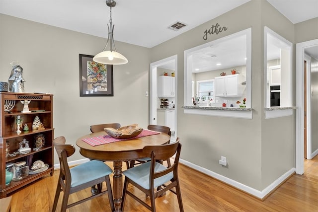 934 Cunningham St, Corpus Christi, TX 78411 - dining space featuring light wood-type flooring and baseboards
