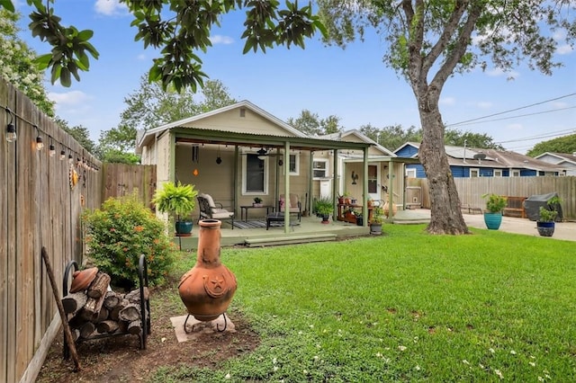934 Cunningham St, Corpus Christi, TX 78411 - back of house with a fenced backyard and a wooden deck