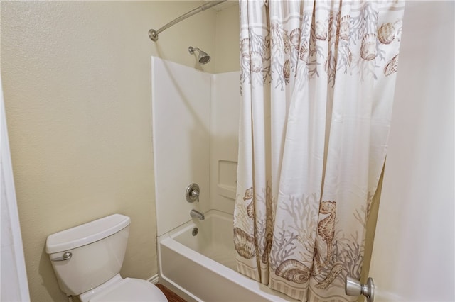 bathroom featuring toilet and shower / bathtub combination with curtain