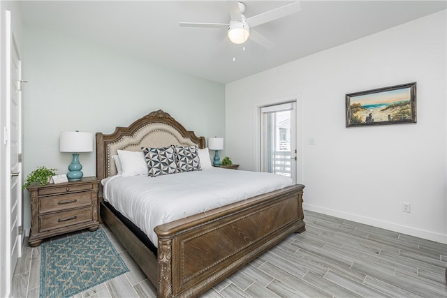 bedroom with light wood-type flooring and ceiling fan