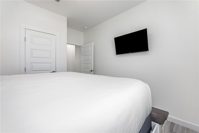 bedroom featuring hardwood / wood-style floors