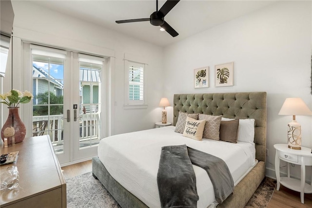 bedroom with ceiling fan, access to outside, french doors, and wood finished floors