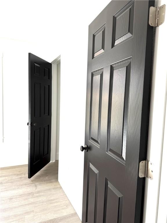 hall featuring light hardwood / wood-style floors