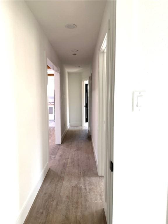 corridor featuring light wood-type flooring