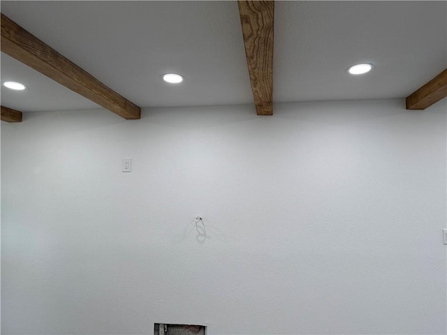 room details featuring beamed ceiling