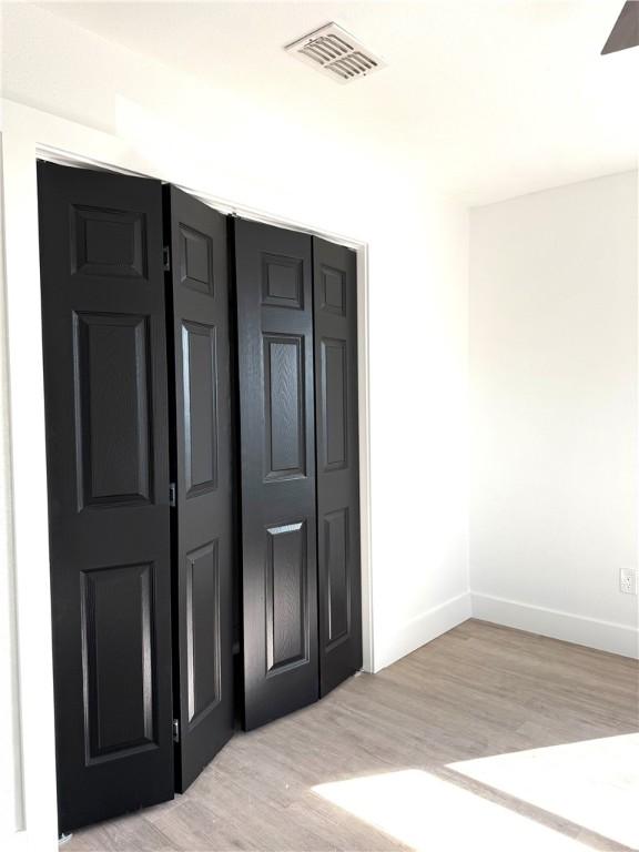 interior space featuring wood-type flooring