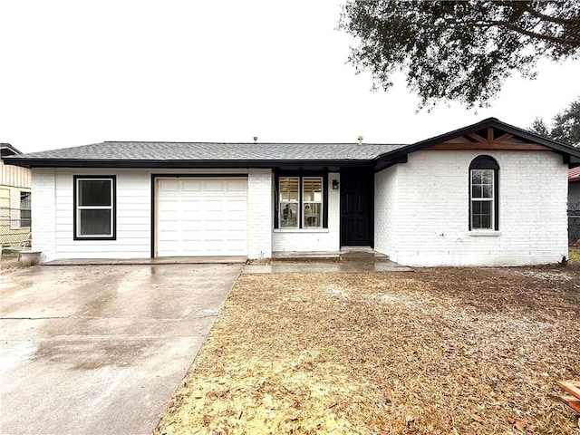 ranch-style home with a garage