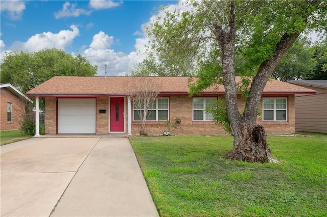 single story home featuring concrete driveway, brick siding, and an attached garage