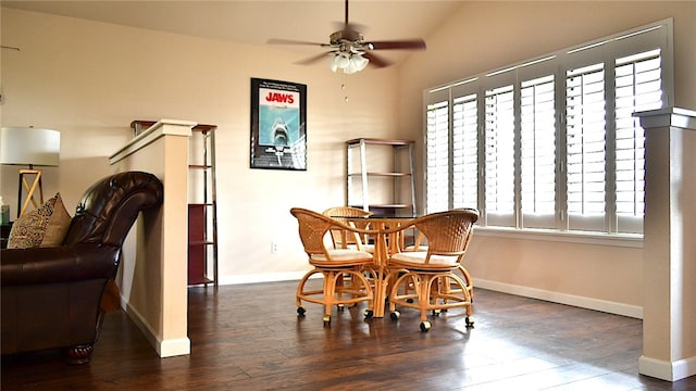 dining area featuring dark wood-type flooring, ceiling fan, and lofted ceiling