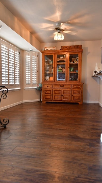 dining room featuring dark wood-type flooring and ceiling fan