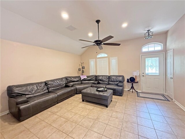 177 Whistlers Cv, Rockport, TX 78382 - living area featuring light tile patterned floors, baseboards, ceiling fan, lofted ceiling, and recessed lighting