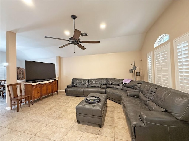 177 Whistlers Cv, Rockport, TX 78382 - living room with lofted ceiling, ceiling fan, light tile patterned floors, and baseboards