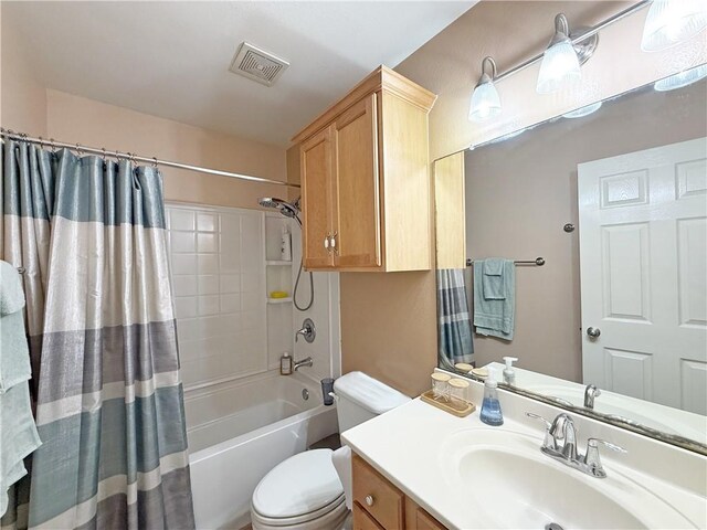 177 Whistlers Cv, Rockport, TX 78382 - bathroom featuring toilet, shower / bath combination with curtain, and vanity
