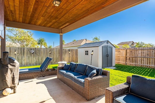 view of patio with an outdoor living space and a shed